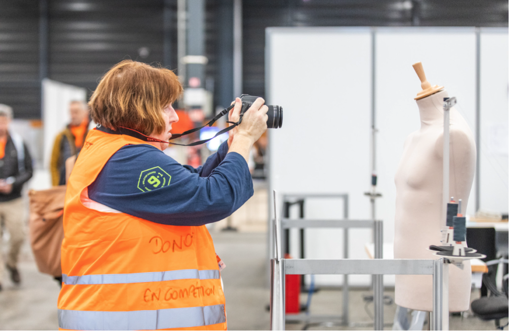 Photography competitor documenting the Abilympic competitions